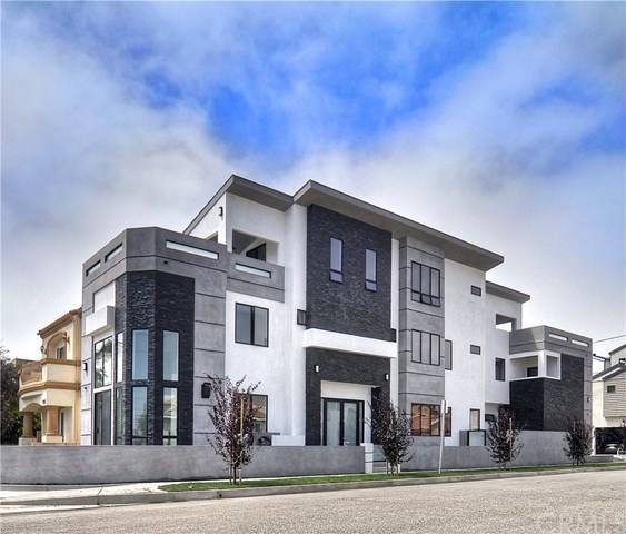 3-story house with roof deck, corner view, cloudy day