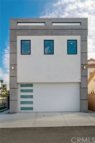 3-story house with roof deck, alley side and garage