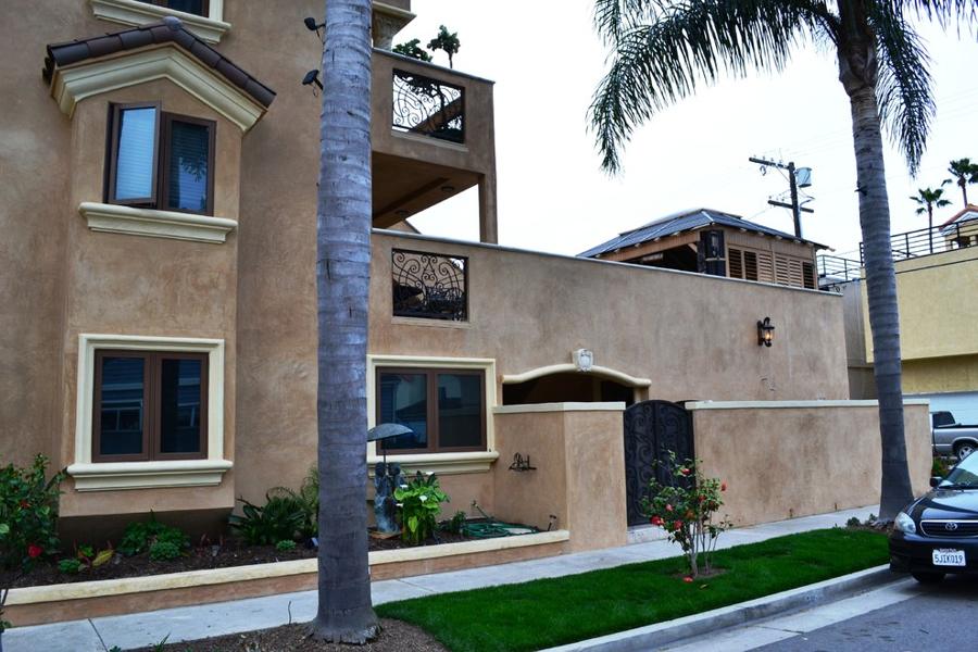 Existing three-story house, side with courtyard wall